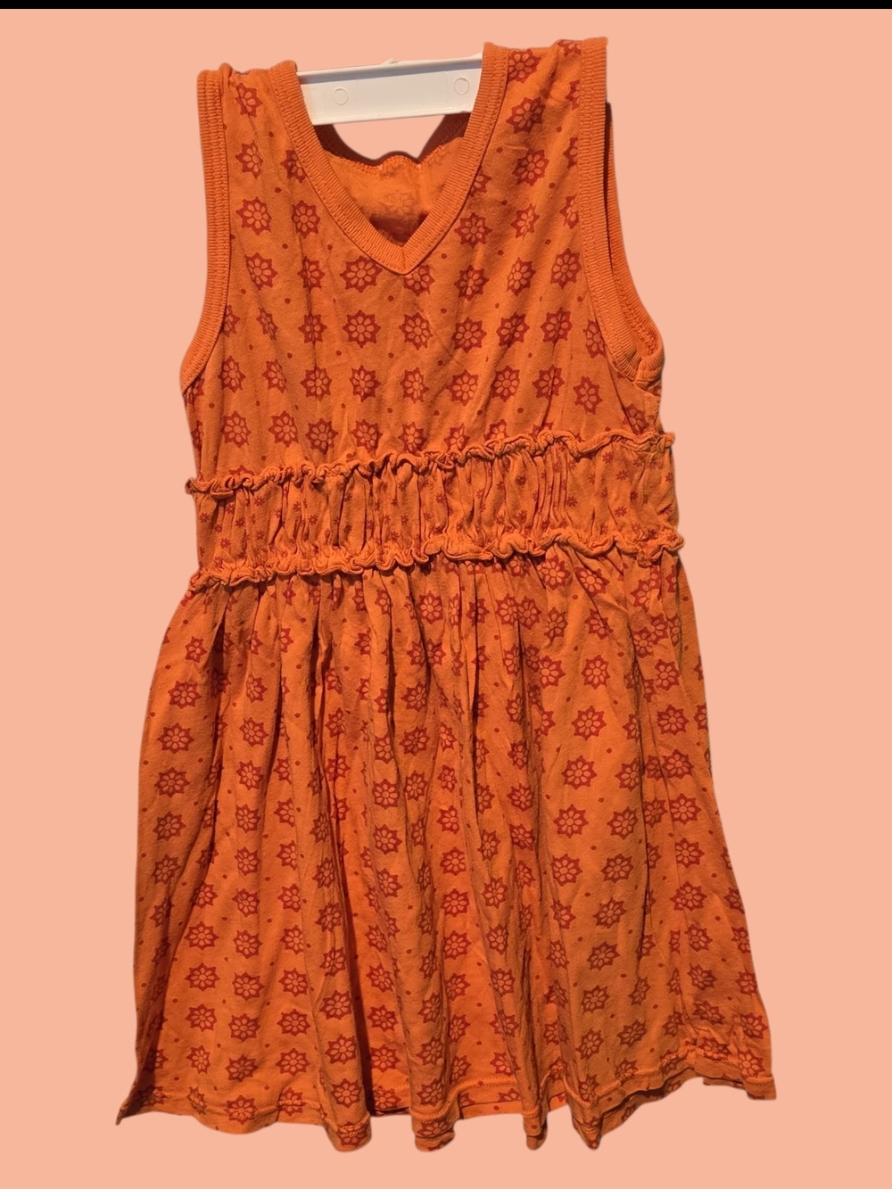 Orange Sleeveless Smocked Waist Dress with Starburst Print